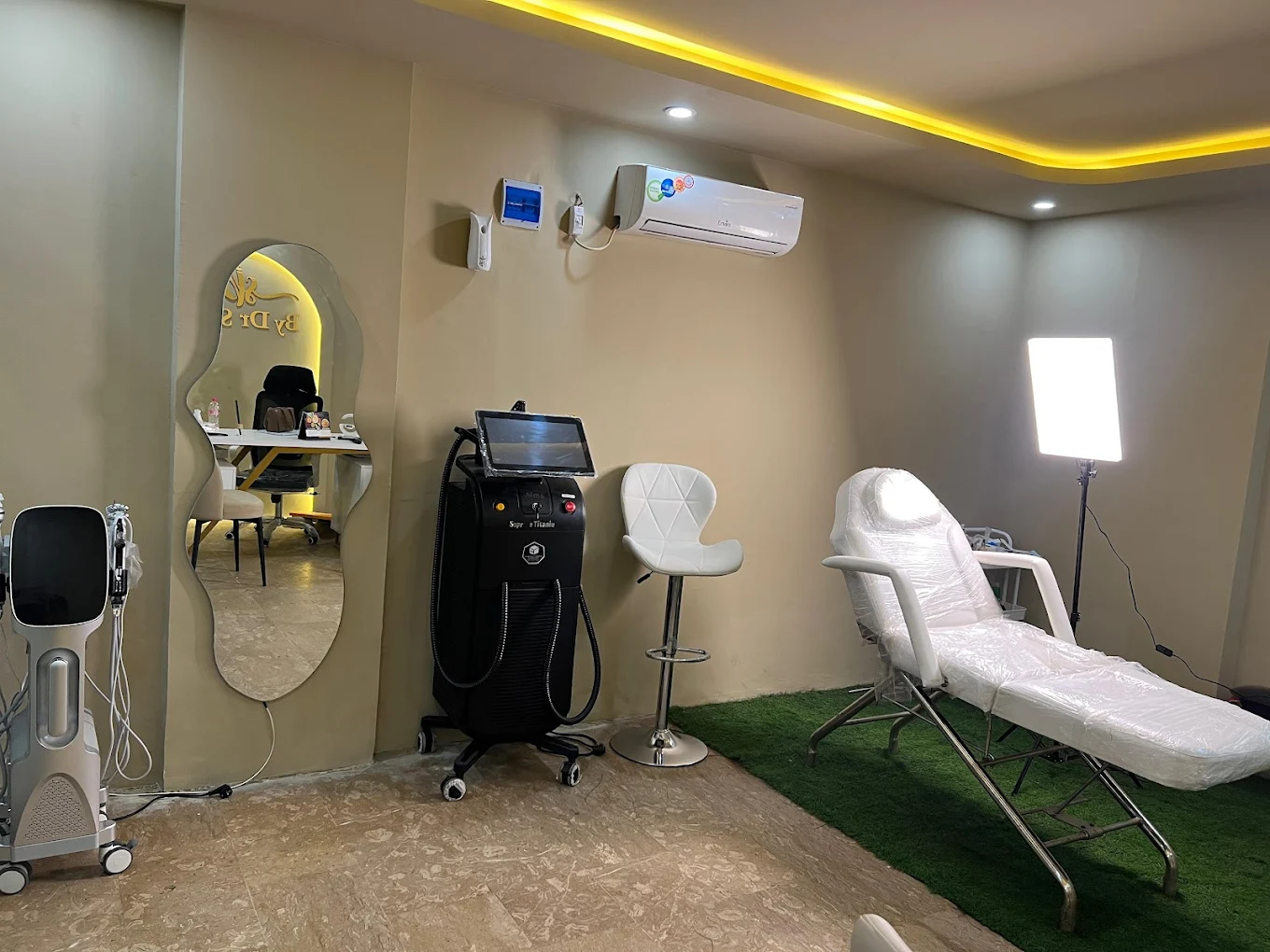 Skin Bliss Karachi Clinic — Treatment Room with laser equipment